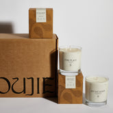 Boujie On Vacation and For Peace scented soy jar candles displayed with eco-friendly packaging.